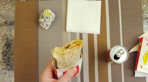 Eating a juicy chicken roll Stock Footage 48439613