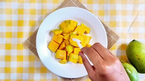 Eating Mango Stock Footage 288995189