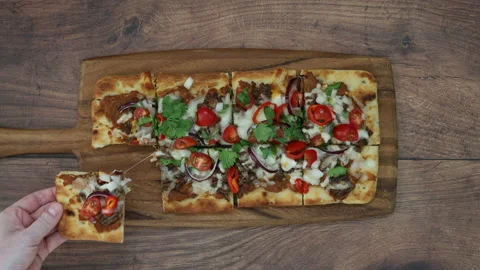 Eating a Mexican Flatbread Pizza Stock Footage 161244703