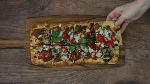 Eating a Mexican Flatbread Pizza Stock Footage 161244792