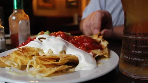 Eating Nachos In A Pub Stock Footage 61865504