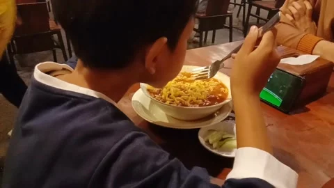 Eating noodles Stock Footage 283543770