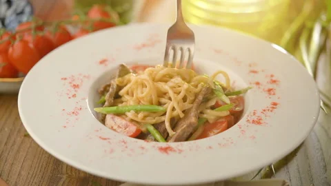 Eating pasta with fork Stock Footage 96582856