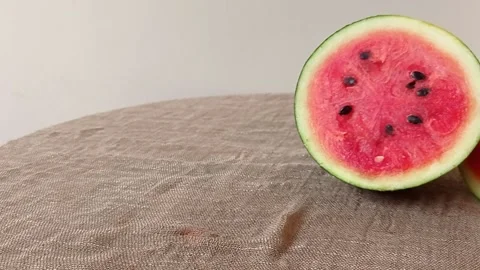 Eating a piece of a small watermelon Stock Footage 145663105
