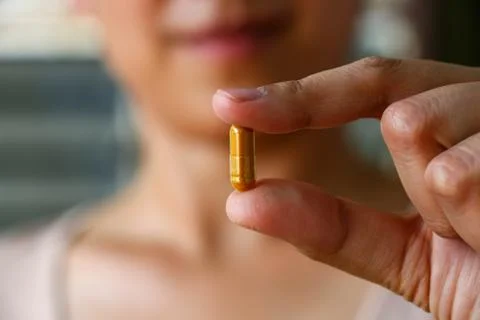 Eating pill Foto stock