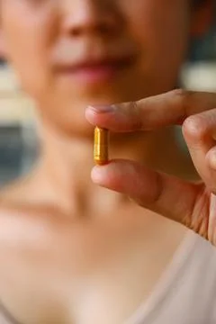 Eating pill Stock Photos