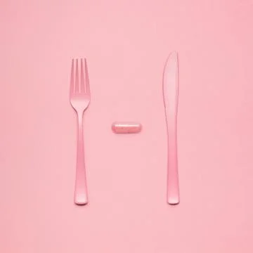 Eating pills. Stock Photos