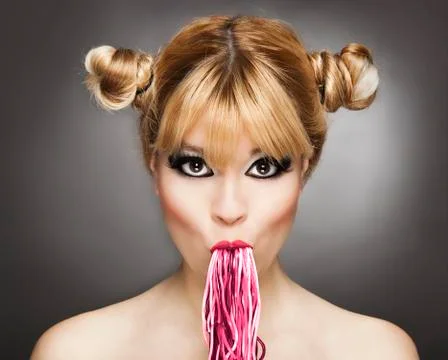 Eating pink gums Stock Photos