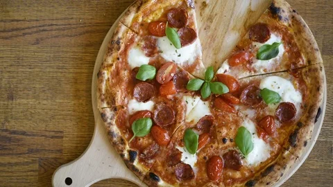 Eating pizza slice by slice,time lapse motion Stock Footage 100818852