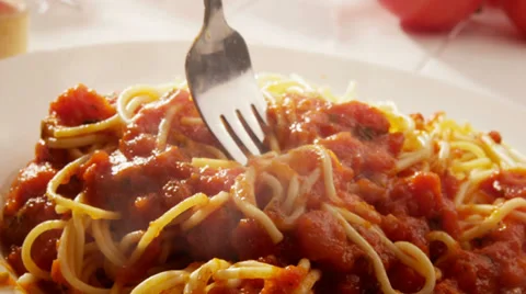 Eating plate of spaghetti Stock Footage