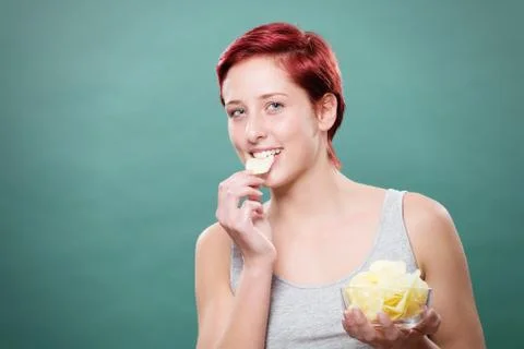 Eating potato chips Stock Photos