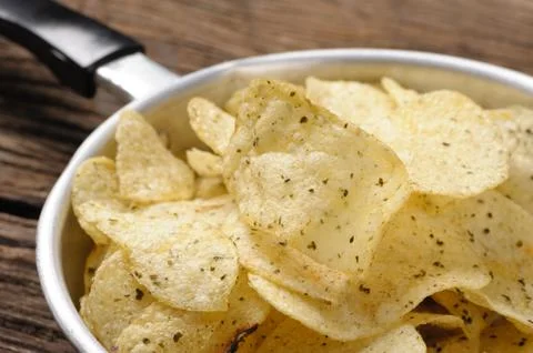 Eating potato chips Stock Photos