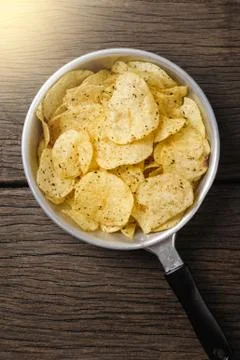 Eating potato chips Stock Photos
