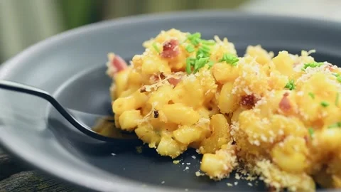 Eating of pumpkin mac and cheese, served in a plate. Stock Footage 170903206