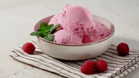 Eating raspberry ice cream with spoon Stock Footage 266587621
