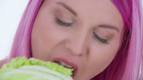 Eating raw radicchio Stock Footage 83725836