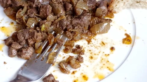 Eating Roasted livers Stock Footage 45884580