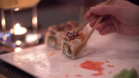 Eating Rolls Maki Sushi From Plate Video stock 89055553