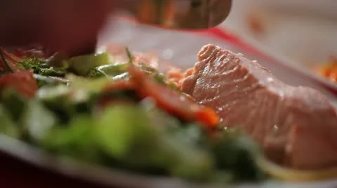 Eating salmon steak Stock Footage 22239242
