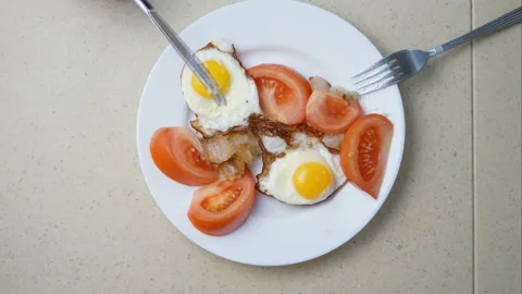 Eating scrambled eggs. timelapse Stock Footage 100235541