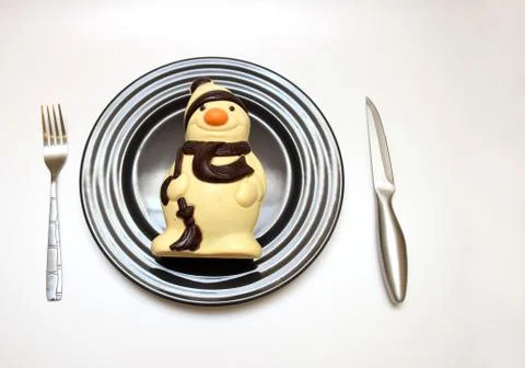 Eating snowman Stock Photos