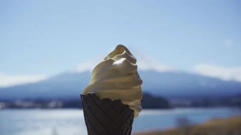 Eating soft serve with mount Fuji view Stock Footage 238060417