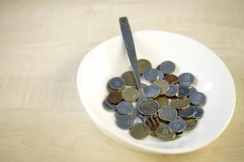 Eating some coins Stock Photos