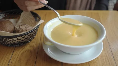 Eating soup and bread in a cozy cafe Stock Footage 342781420
