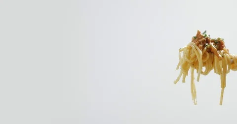Eating spagetti bolognese with a fork Stock Footage 81617308