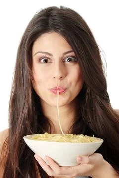 Eating spaghetti Stock Photos