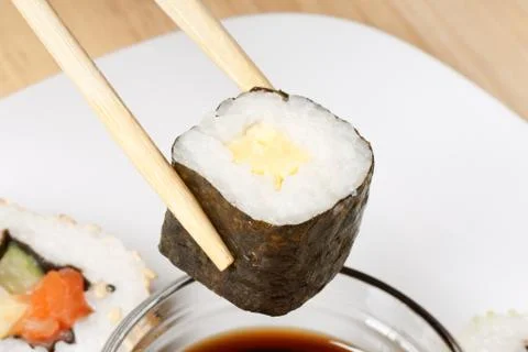 Eating sushi Stock Photos