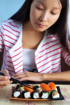 Eating sushi Stock Photos