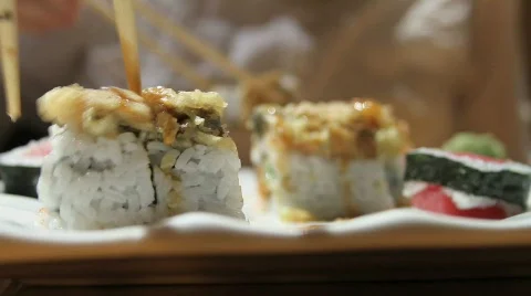 Eating a Sushi Roll at dinner Video stock 549211