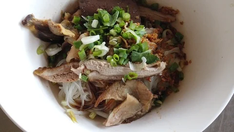 Eating Thai noodle Stock Footage 100121000
