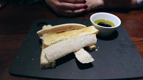 Eating three bread selection in restaurant Video stock 48220598