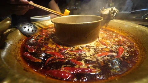 Eating traditional Chengdu hot pot. Stock Footage