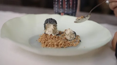 Eating Truffle Dessert With Crushed Nuts. - closeup shot 스톡 동영상 320113054