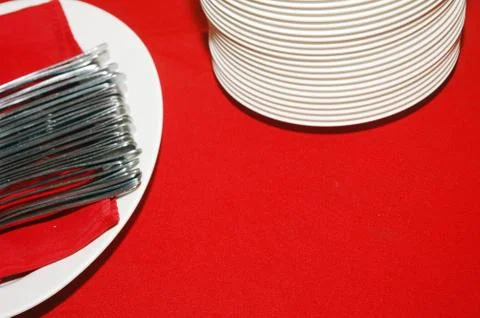 Eating utensilsstack of plates and spoons 写真素材