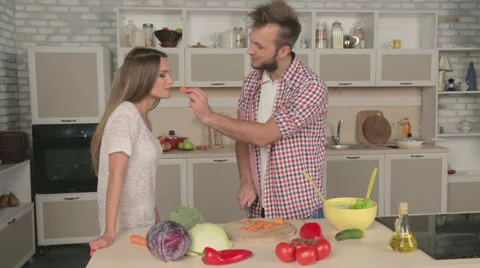 Eating vegetables on the kitchen Video stock 57822487