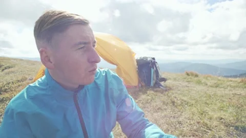 Eating while hiking. close-up of spoon and dishes. A portrait of a tourist Stock Footage 217395901
