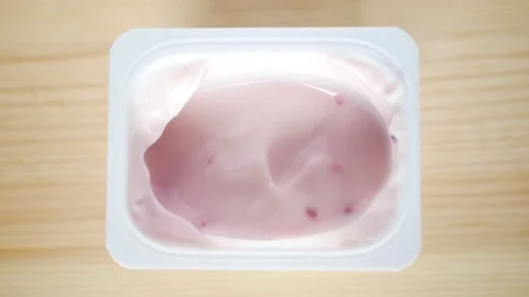 Eating yogurt with berries. Stock Footage 70516608