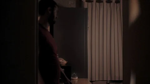 Eats from the fridge at night Stock Footage 120543984