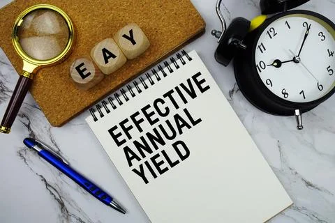EAY Effective Annual Yield text written on notepad with magnifying glass an.. Stock Photos