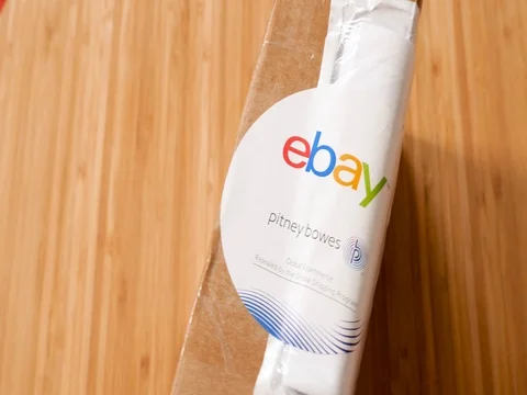EBay and Pitney Bowens logo printed on cardboard box delivery 库存影片 76790844