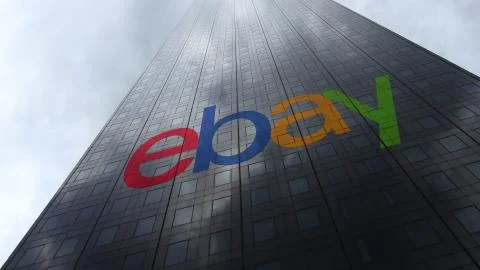 EBay Inc. logo on a skyscraper facade reflecting clouds. Editorial 3D rendering Ilustración de archivo