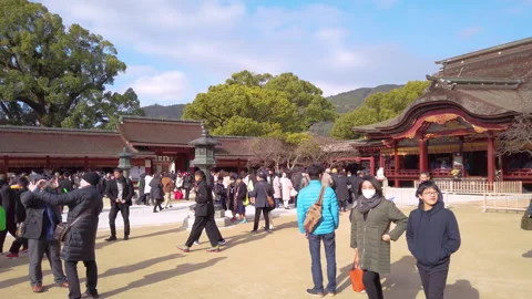 Ebb and flow of tourists in the expansive of Dazaifu Shrine in Japan. Stock Footage 255543332