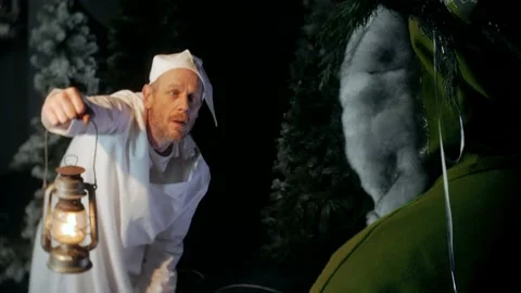 Ebeneezer Scrooge is visited by the Ghost of Christmas Present in Charles Stock Footage 143369123