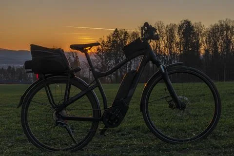 Ebike with sunset light over Ceske Budejovice city in south Bohemia Stock Photos