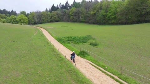 Ebike through field in guildford  Stock Footage 274233076