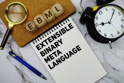 EBML Extensible Binary Meta Language text written on notepad with calculato.. Photos